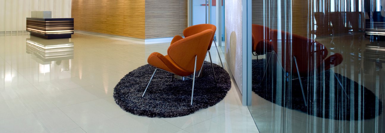 A modern office interior with a lounge chair